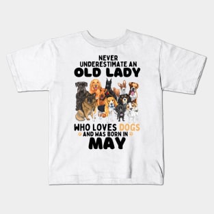 Never Underestimate An Old Lady Who Loves Dogs And Was may Kids T-Shirt